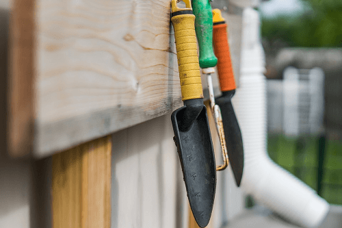 hanging trowels and other courtyard garden ideas