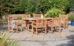 Uppingham Oval Sunburst 6 Seater Outdoor Teak Dining Set.
