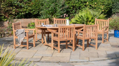 Uppingham Oval Sunburst 6 Seater Outdoor Teak Dining Set.